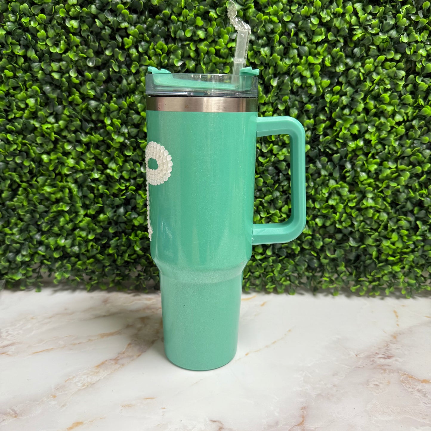 Teal tumbler with white rhinestone bow